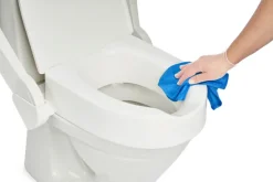 Rehausseur de toilettes Etac My-Loo - fixe, avec couvercle , ep. 6 cm, fixé sur toilettes