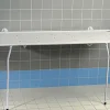 Table de douche murale Ambre hauteur fixe - avec barrière de sécurité - relève buste - rabattable contre le mur